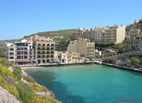 Xlendi Sea Front from the northern cliff path