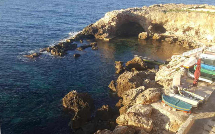 Ghar Lapsi, with the cave top centre