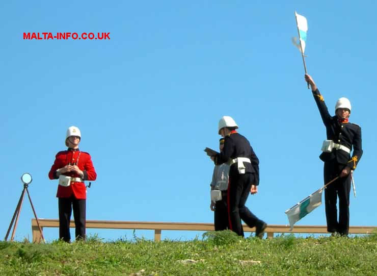 Semaphore flags, displaying K or 0 (zero)